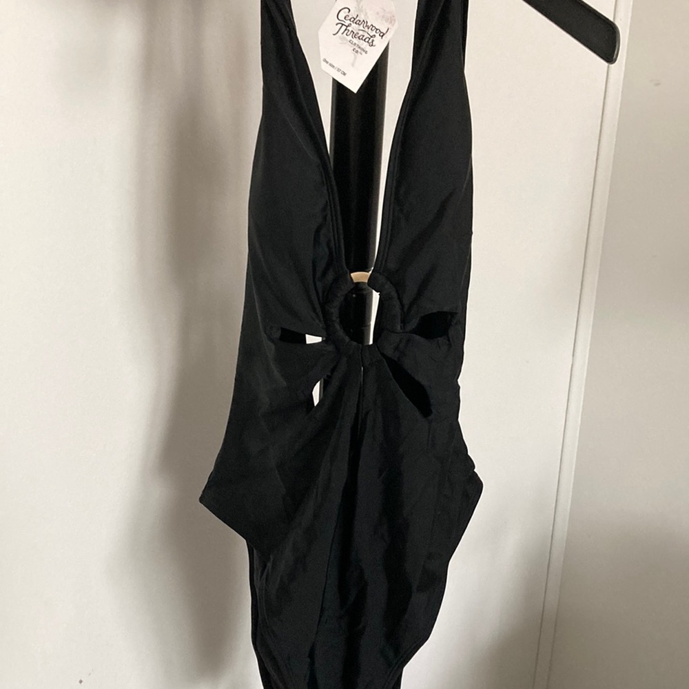 Brand new black swimsuit.